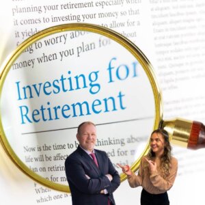 Image of Mike in Madison hosts of not just numbers podcast. They are standing in front of a magnifying glass that is enlarging the words investing for retirement in this episode they go through asset allocation